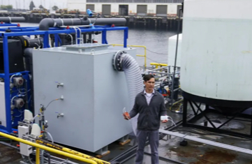 Professor Simonetti in the ICM Equatic plant for seawater carbon dioxide removal
